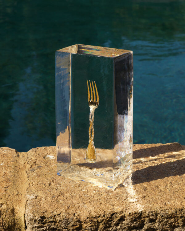 Puiforcat Royal Fork mood photo showing the fork frozen in an ice block.