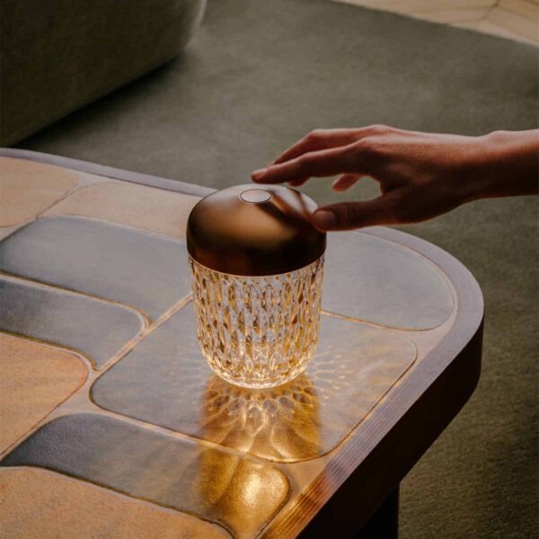Saint-Louis Folia Mini Portable Light with Cut Crystal Base and aluminum top in copper finish.