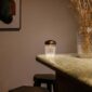 Saint-Louis Folia Mini Portable Light with Cut Crystal Base and aluminum top in copper finish.