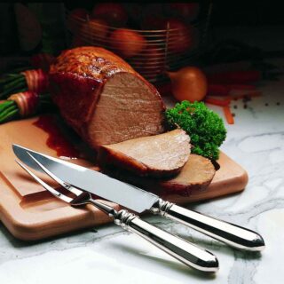 Robbe & Berking Navette Silver Carving Set Lifestyle Image.