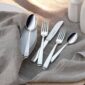 Robbe & Berking Silver Flatware lifestyle photo featuring the Alta pattern on tablecloth.