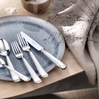 Robbe & Berking Silver Flatware lifestyle photo featuring the Art Deco pattern.
