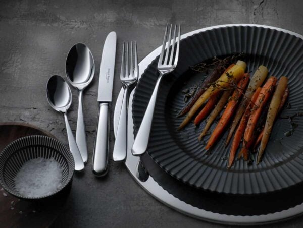 R&B-Silver-Dante-5-piece-place-setting-1200w-100KB Robbe & Berking Silver Flatware lifestyle photo featuring the Dante pattern.