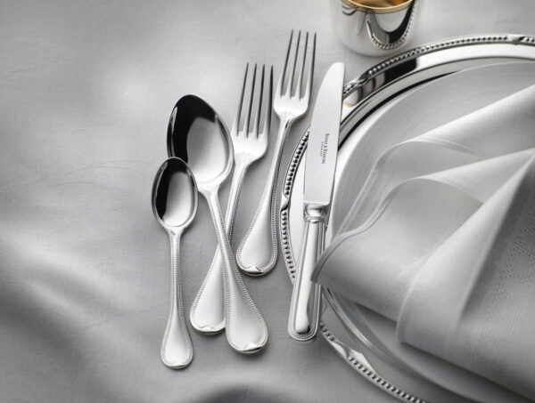 R&B-Silver-Franzoesisch-Perl-5-piece-place-setting-1200w-100KB Robbe & Berking Silver Flatware lifestyle photo featuring the French Pearl pattern.