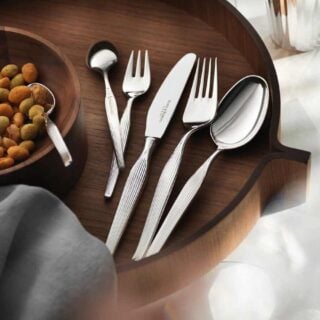 Robbe & Berking Silver Flatware lifestyle photo featuring the Metropolitan pattern.