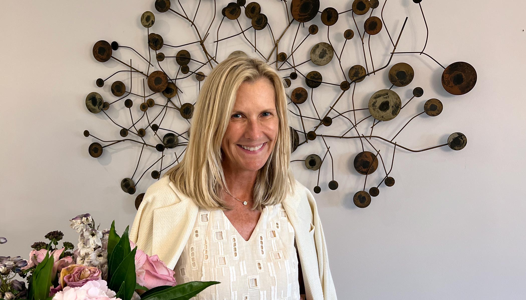Mary Jeanne Kneen with a bouquet of summer flowers