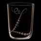 Lobmeyr Drinking Set no. 4 Monogrammed Tumbler. Monograms designed by Ted Muehling mood shot with black background.