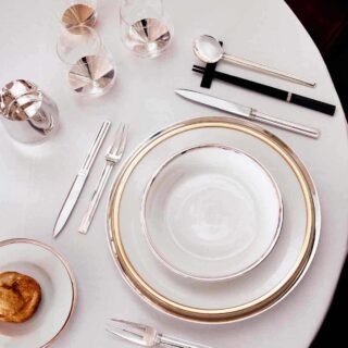 A Table Setting with Puiforcat Cercle d’Orfèvre Porcelain Dinnerware with Cannes Sterling Silver Cutlery