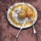 Puiforcat Noailles Flatware Mood Photo with Oranges | Kneen & Co