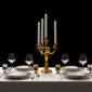 Puiforcat Elysee Flatware in Sterling Silver and Cercle D'Argent Dinnerware; also shown is Saint-Louis Folia Stemware and Puiforcat Champagne Cups in Silver and Gold | Kneen & Co