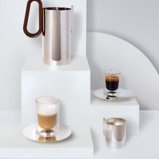 Puiforcat Phi Coffee and Tea Collection Lifestyle Photo with Espresso and Latte Drinks | Kneen & Co