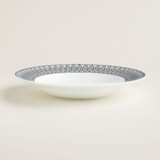 Hermes H Deco Porcelain Soup Plate on table view | Kneen & Co