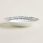 Hermes H Deco Porcelain Round Deep Platter on table view | Kneen & Co
