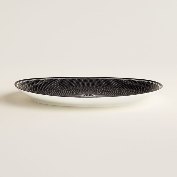 Hermes H Deco Porcelain Medium Oval Platter on table view | Kneen & Co