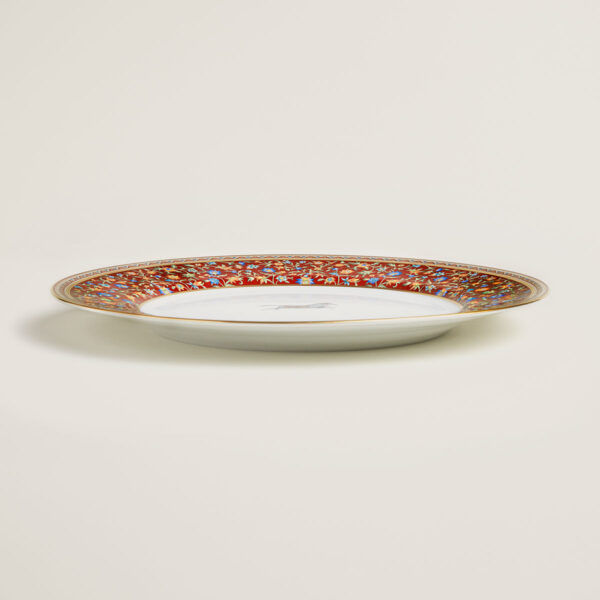 Hermes Cheval D'Orient Porcelain Dinner Plate on table view | Kneen & Co