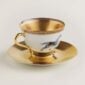 Hermes Cheval D'Orient Porcelain Gold Tea Cup and Saucer other view | Kneen & Co
