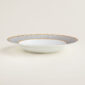 Hermes Mosaique au 24 Gold Rim Soup Plate shown on table | Kneen & Co