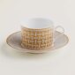 Hermes Mosaique au 24 Gold Tea Cup and Saucer shown on table | Kneen & Co