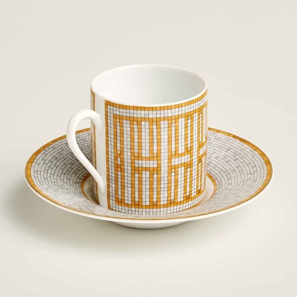 Hermes Mosaique au 24 Gold Espresso Cup and Saucer shown on table | Kneen & Co