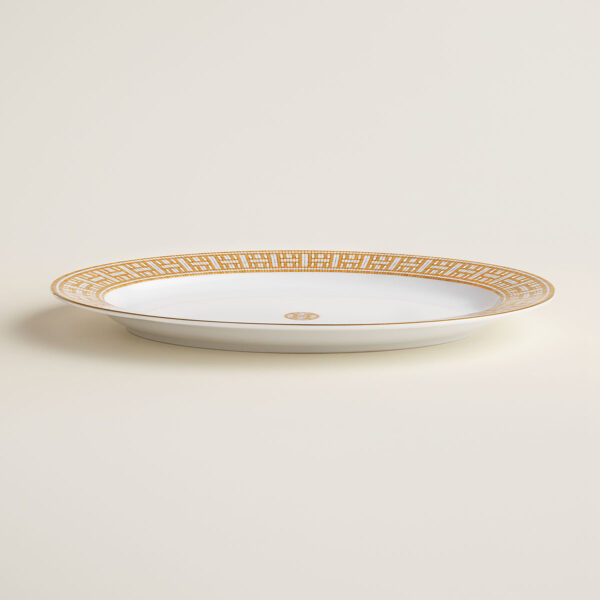 HERMES-DNRWR-Mosaique-au24-Or-026027P-worn-3-1200x1200px-100KB Hermes Mosaique au 24 Gold Small Oval Platter shown on table | Kneen & Co