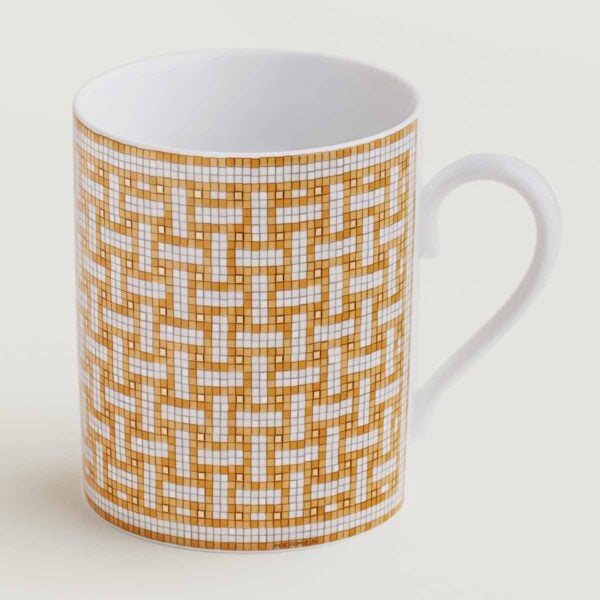 Hermes Mosaique au 24 Gold Mug shown on table | Kneen & Co