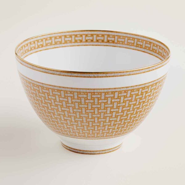 Hermes Mosaique au 24 Gold Punch Bowl shown on table | Kneen & Co