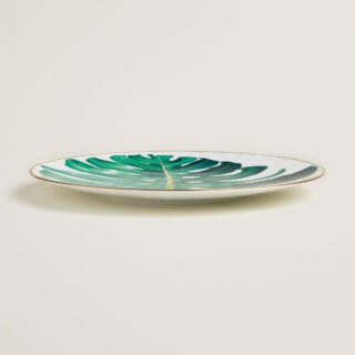 Hermes Passifolia Dinner Plate Philodendron shown on table | Kneen & Co