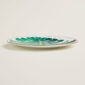 Hermes Passifolia Dinner Plate Philodendron shown on table | Kneen & Co