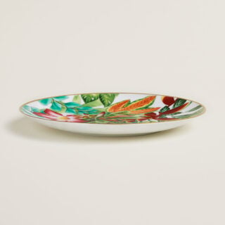 Hermes Passifolia Dessert Plate Desert Rose shown on table | Kneen & Co