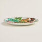Hermes Passifolia Dessert Plate Desert Rose shown on table | Kneen & Co