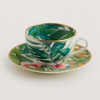 Hermes Passifolia Tea Cup and Saucer shown on table | Kneen & Co