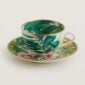 Hermes Passifolia Tea Cup and Saucer shown on table | Kneen & Co