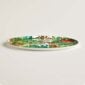 Hermes Passifolia Large Round Platter shown on table | Kneen & Co