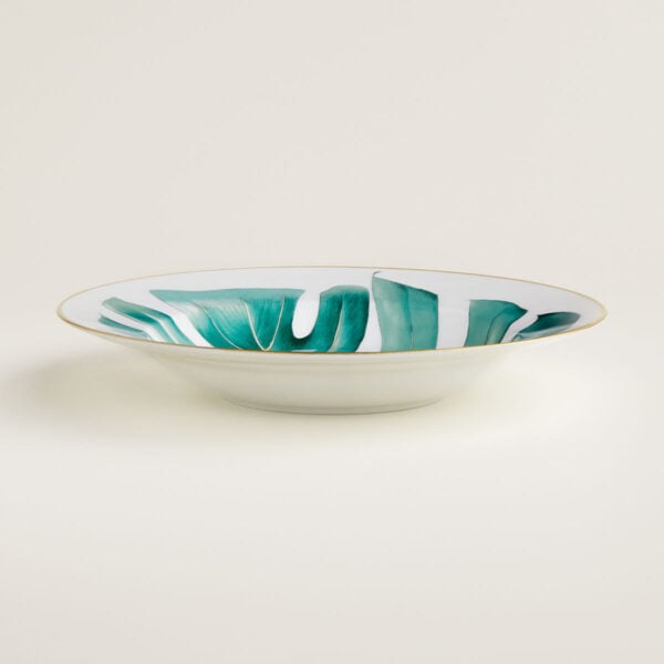 Hermes Passifolia Soup Plate shown on table | Kneen & Co