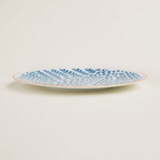Hermes A Walk in the Garden Blue Dinner Plate shown on table| Kneen & Co