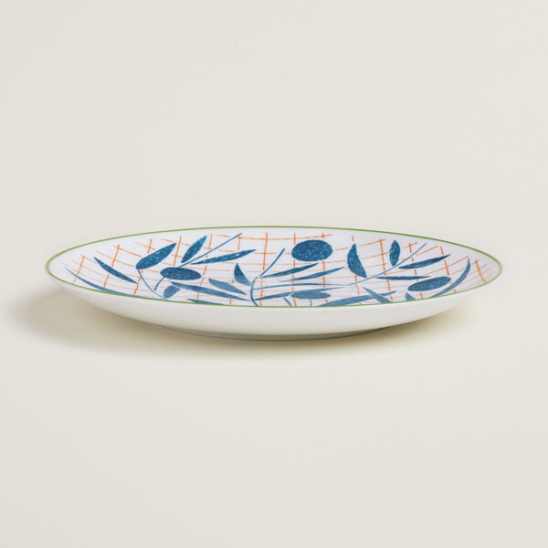 Hermes A Walk in the Garden Dessert Plate Blue shown on table| Kneen & Co