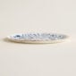 Hermes A Walk in the Garden Tart Platter shown on table | Kneen & Co