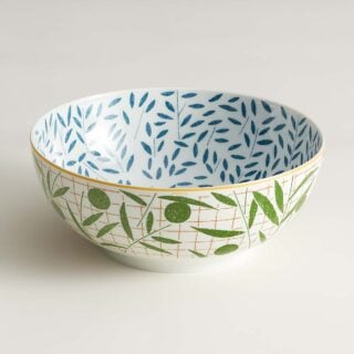 Hermès A Walk In The Garden Salad Bowl shown on table | Kneen & Co