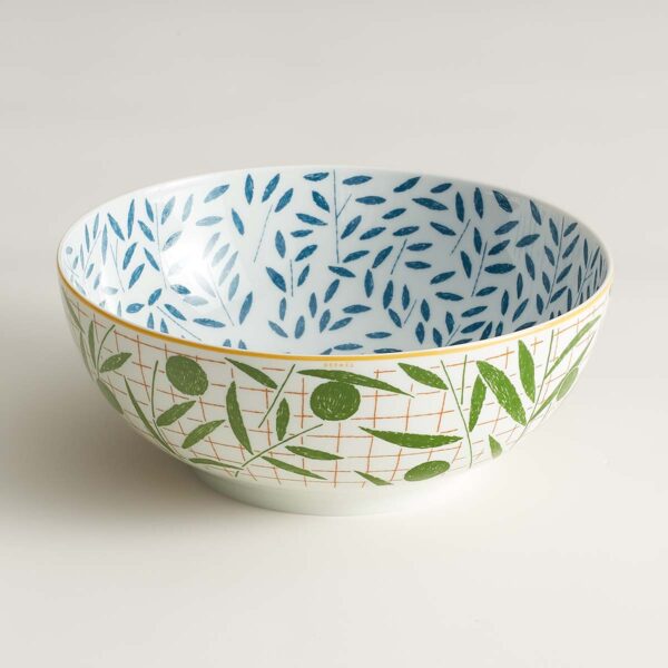Hermès A Walk In The Garden Salad Bowl shown on table | Kneen & Co