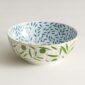 Hermès A Walk In The Garden Salad Bowl shown on table | Kneen & Co
