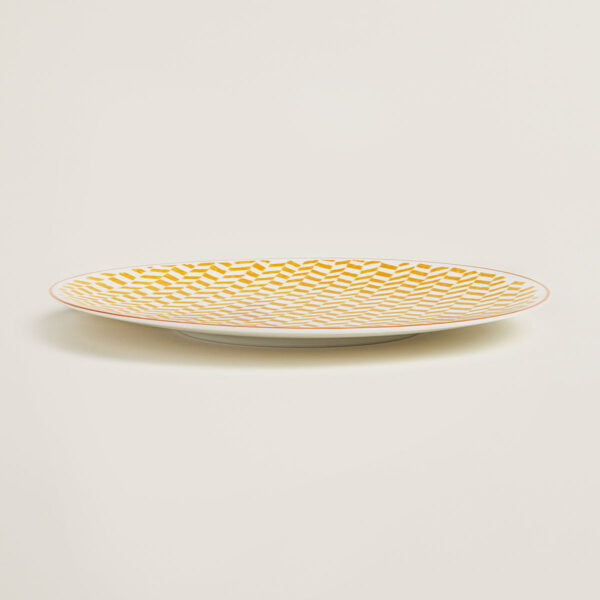 Hermes A Walk in the Garden Dinner Plate Yellow shown on table | Kneen & Co