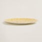Hermes A Walk in the Garden Dinner Plate Yellow shown on table | Kneen & Co