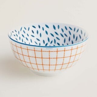 Hermes A Walk in the Garden Large Bowl shown on table | Kneen & Co