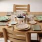 Hermes A Walk in the Garden Dinnerware set on dining table | Kneen & Co