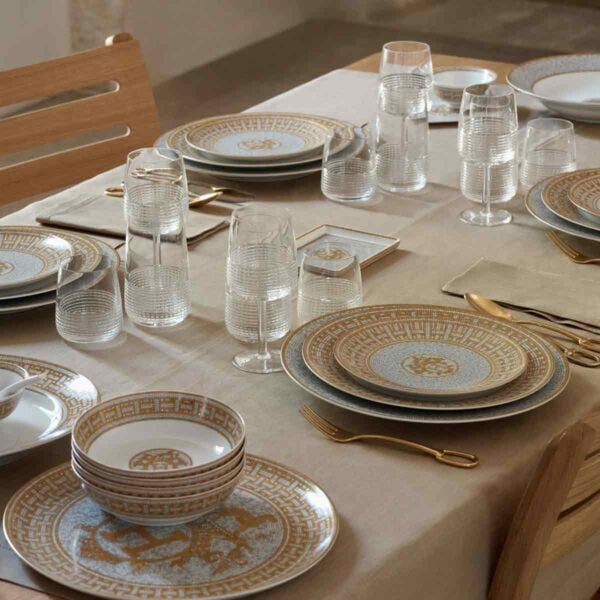 Hermes Mosaique au 24 Gold Dinnerware Table Setting with hermes Intervalle Glassware and bowls | Kneen & Co