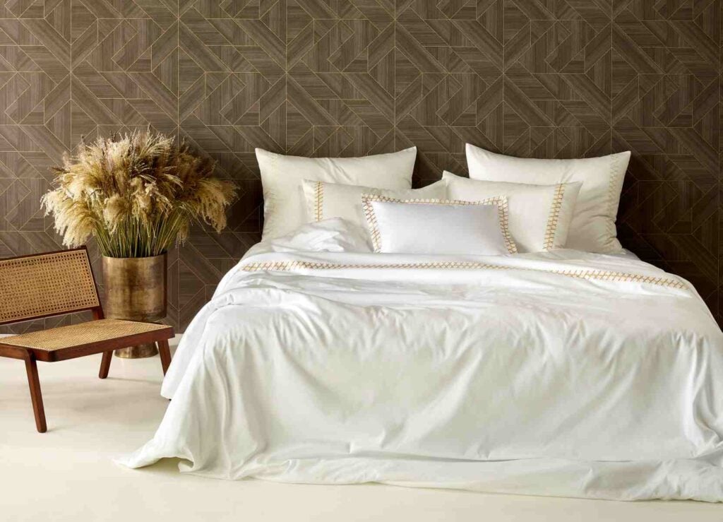Luxury Mirabel Slabbinck Topali bedding in soft, neutral tones, featuring crisp embroidered linens and refined Belgian craftsmanship—elevating the bedroom into a serene sanctuary.
