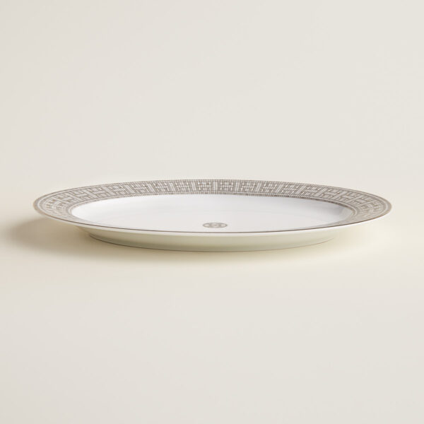 HERMES-DNRWR-Mosaique-au24Platine-035027P-worn-3-1200x1200px-100KB Hermès Mosaique Au 24 Platinum Small Oval Platter shown on table | Kneen & Co