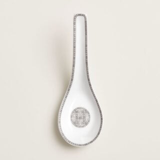Hermès Mosaique Au 24 Platinum Oriental Soup Spoon shown on table | Kneen & Co