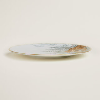 Hermès Carnets d'Equateur Jaguar Dinner Plate shown on table | Kneen & Co
