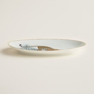 Hermès Carnets d'Equateur Small Oval Platter shown on table | Kneen & Co
